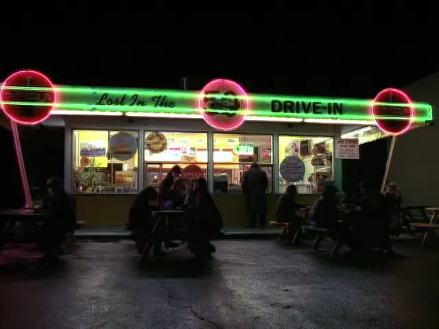 A drive-in restaurant at night in the Sliders episode Greatfellas