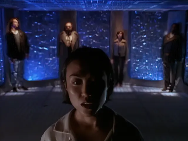 Mary, the Kromagg's telepathic slave standing in front of the Sliders in the episode Invasion