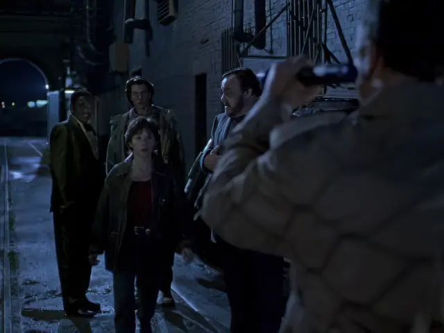 The Sliders team being captured at night by Communists in the Pilot episode